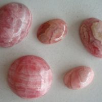 Lot of 5 rhodochrosite cabochons, various sizes