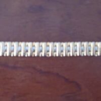 Golden jewelry bracelet with silver hooks - Image 3