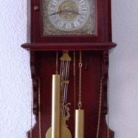 Radiant pendulum wall clock for living room