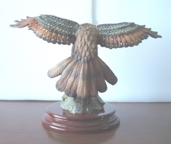 Eagle figure displayed with wooden base - Image 3