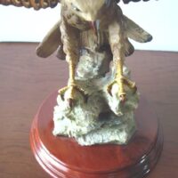 Eagle figure displayed with wooden base - Image 6