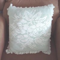 Green cushion with white crochet cover, unique piece