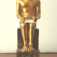 Small golden figure of a scribe from Ancient Egypt